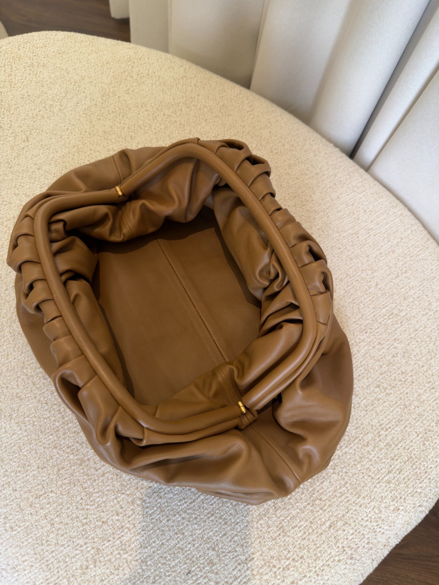 Bottega Veneta The Pouch brown leather interior detail