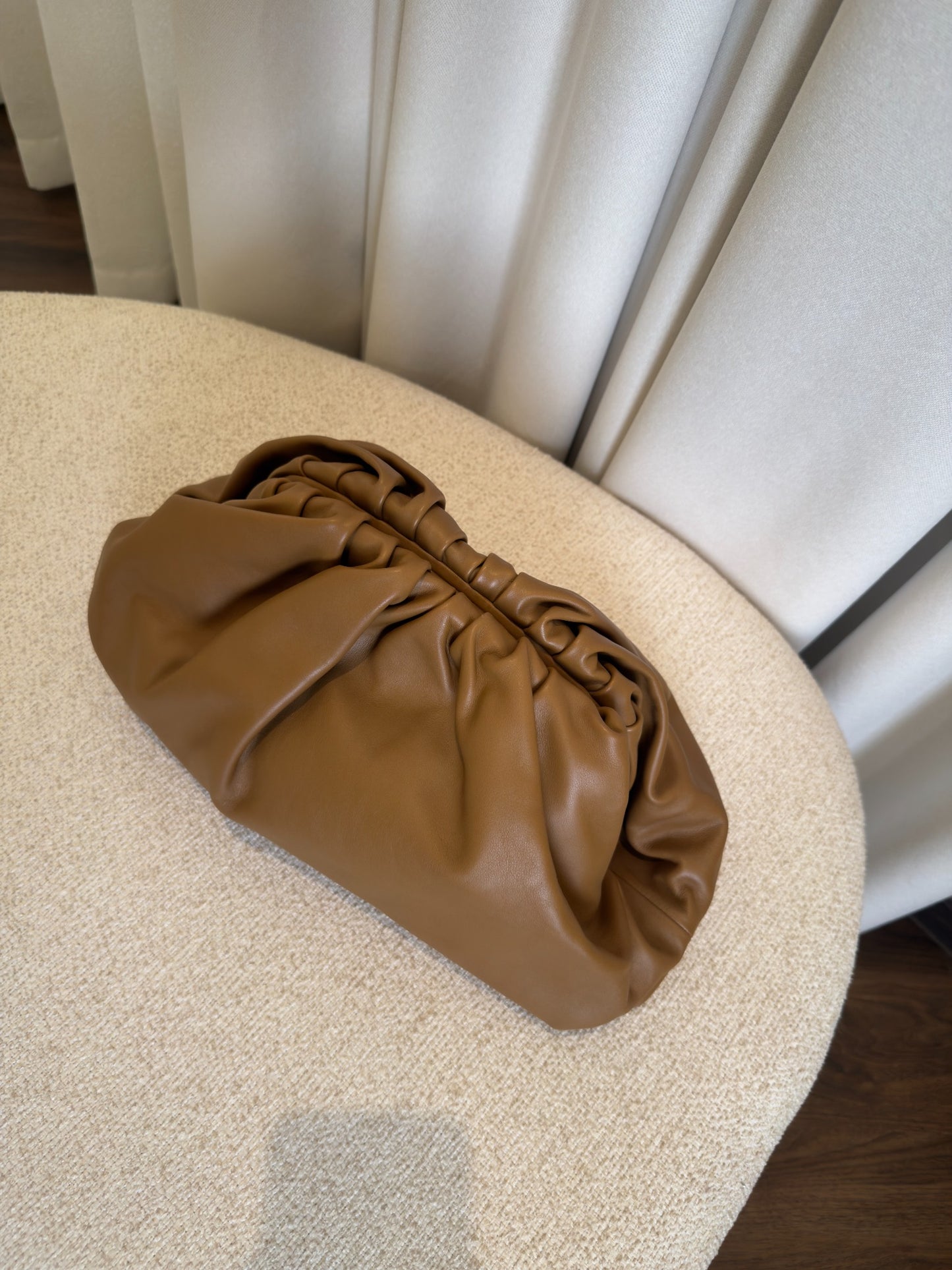 Bottega Veneta The Pouch brown leather three-quarter view