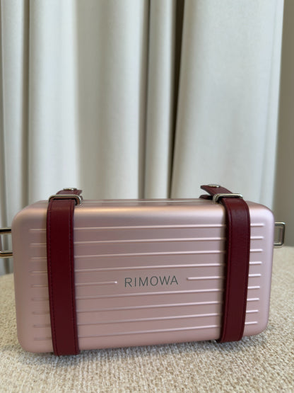 Dior x RIMOWA pink aluminium personal clutch RIMOWA back view