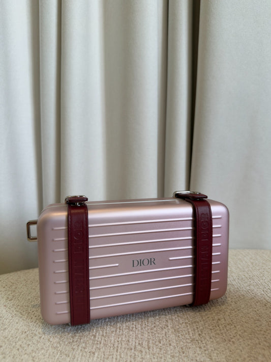 Dior x RIMOWA pink aluminium personal clutch DIOR front view