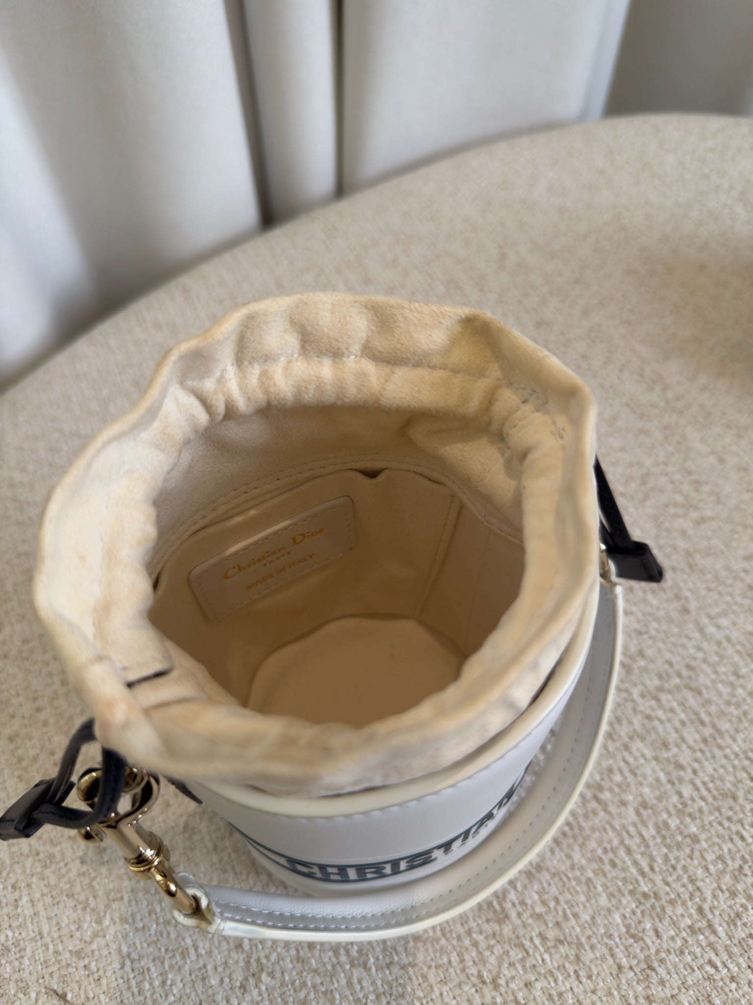 Dior Small Vibe white and navy leather bucket bag base and interior detail