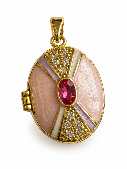 Blush pink oval locket journal charm with a deep raspberry red center and lilac accents on a white background