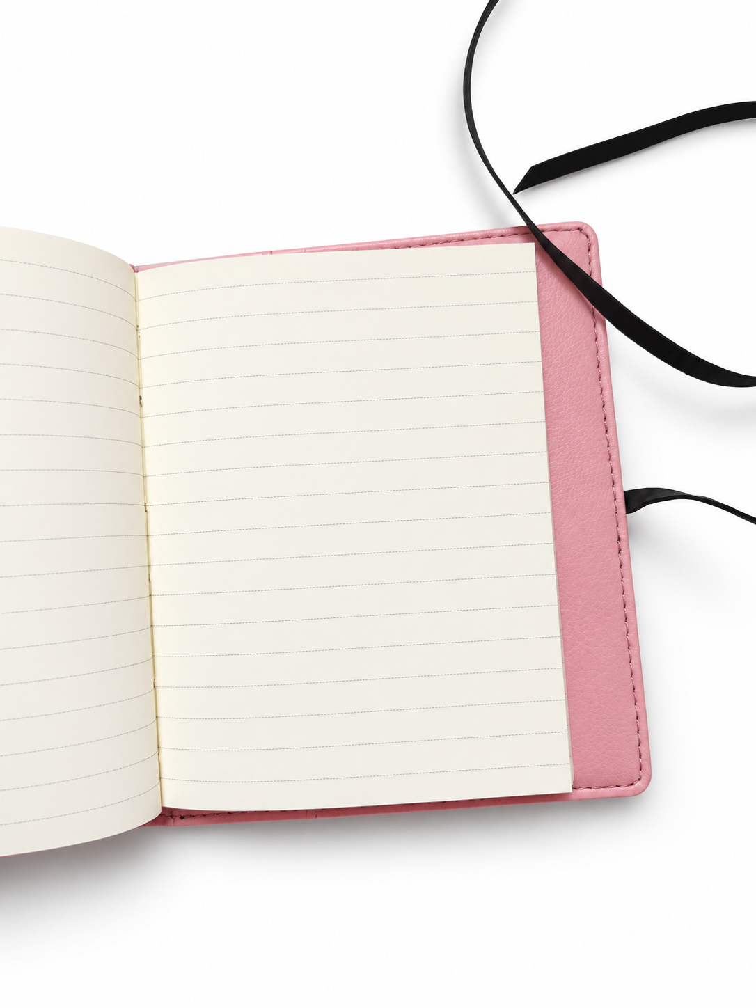 Close-up of the cream lined paper refill inside the Elali journal, with pale pink cover visible on white background