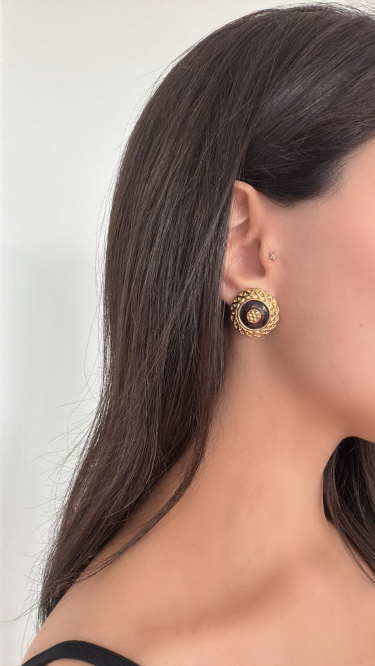 Vintage brown and gold-tone button earrings worn