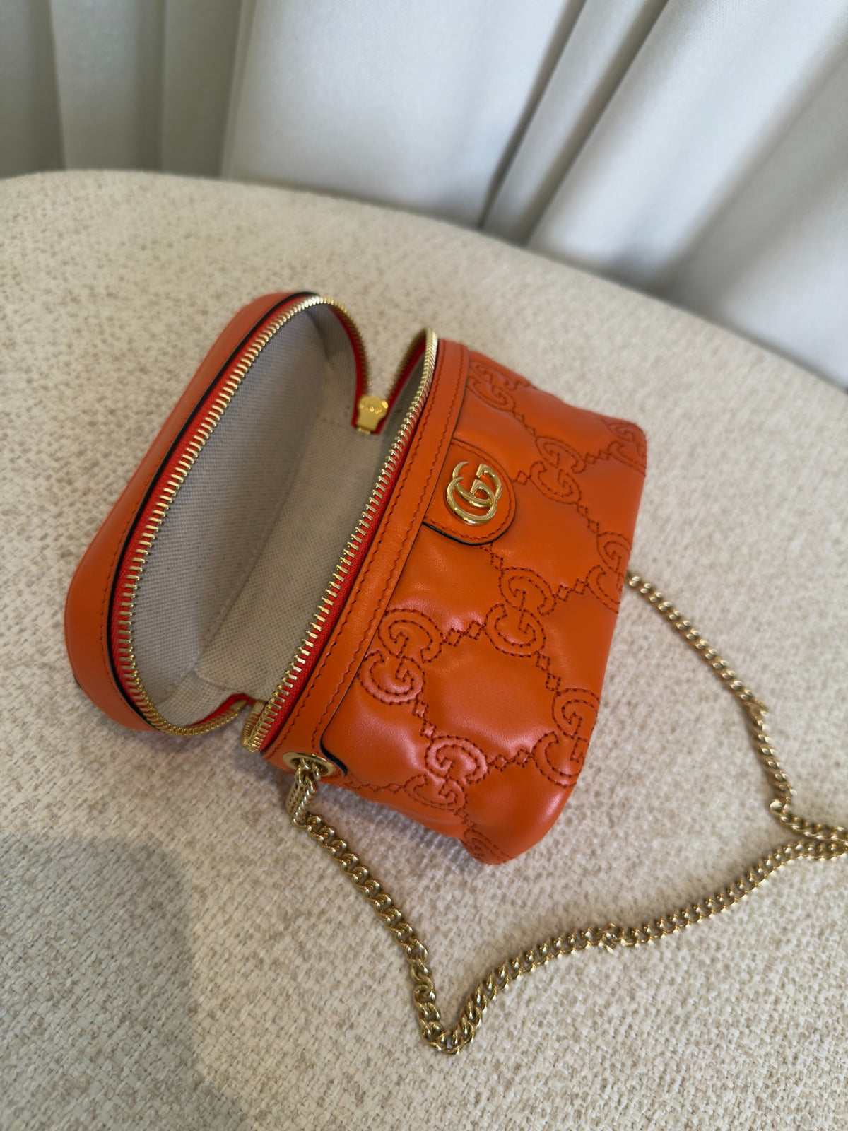 Gucci GG Marmont orange mini vanity case open top view