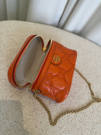 Gucci GG Marmont orange mini vanity case open top view