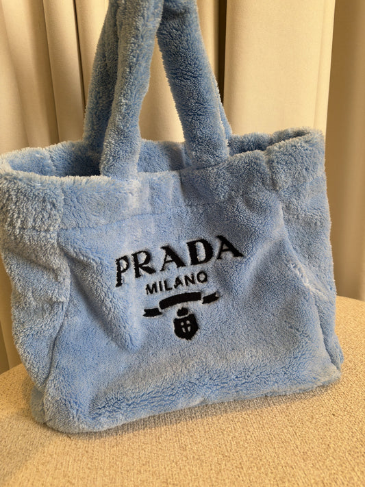 Prada terry cloth tote Celeste blue front three-quarter view